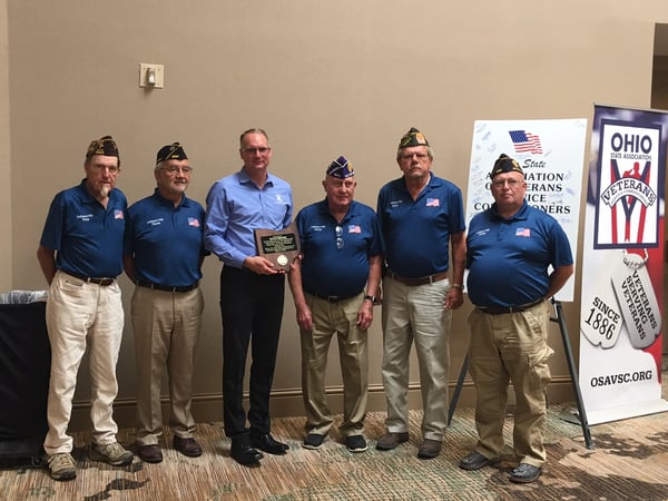 Bryan Keller pictured with Ohio State Veterans Service Commissioners: Peter Kenner, Thomas Kent, Darcy Lehman, Dave Lulfs, Chris Newton - receiving award